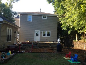 Removing the existing deck to make way for new foundation.  